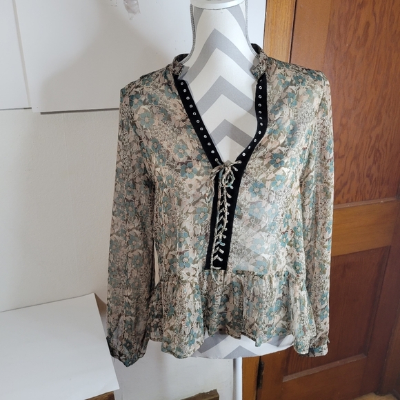 Zara Tops - Zara Lace up Semi sheer Floral Long sleeve top Ruffled bottom Size Large